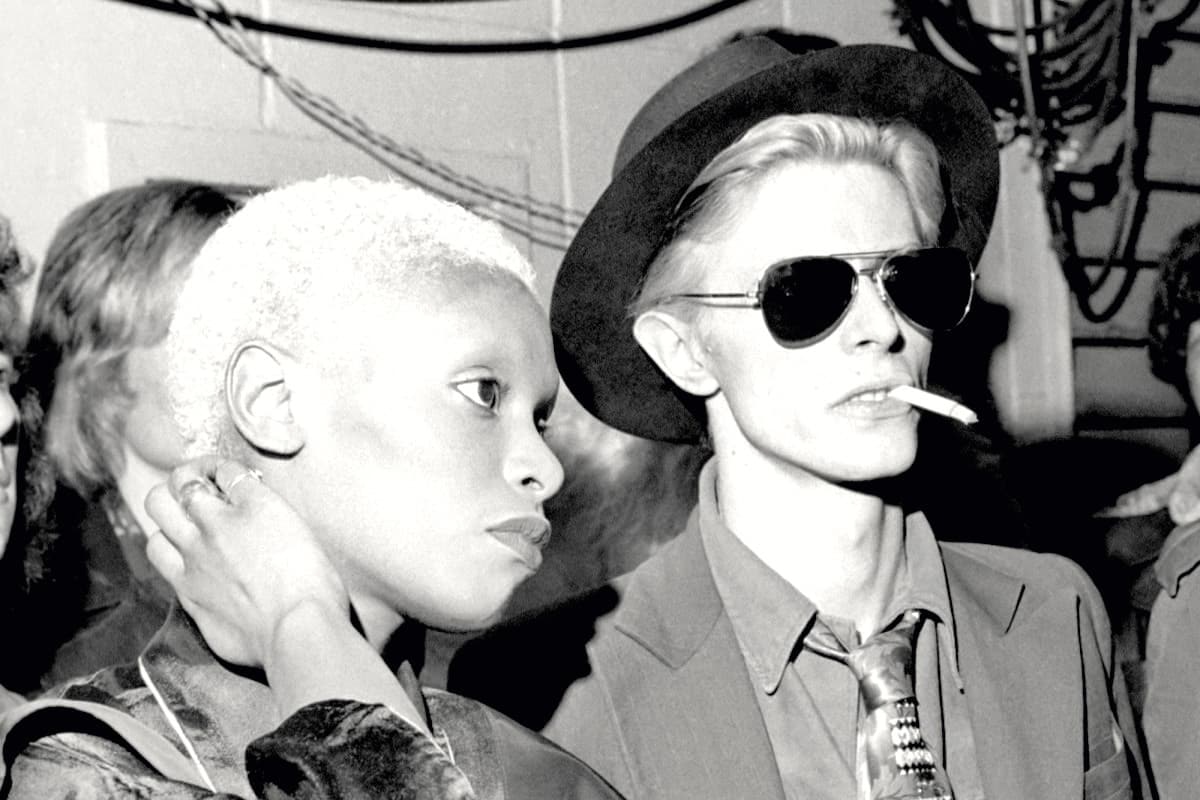 Model and singer Ava Cherry with David Bowie.